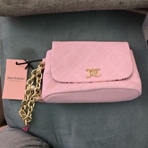 Juicy Couture Light Pink Top Notch Mini Wristlet With Chain/Charms Embossed Bag
